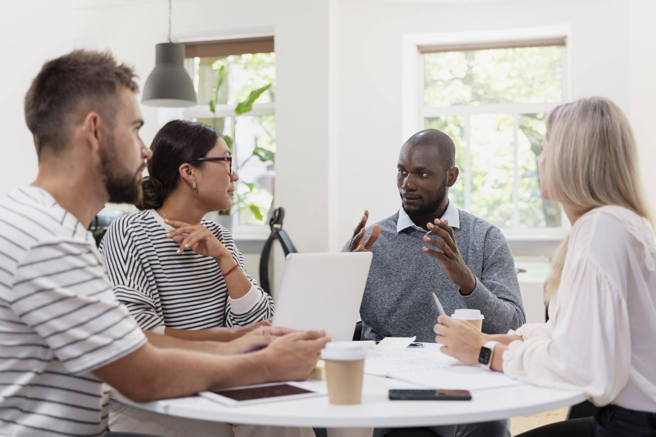 close-up-young-colleagues-having-meeting (1)